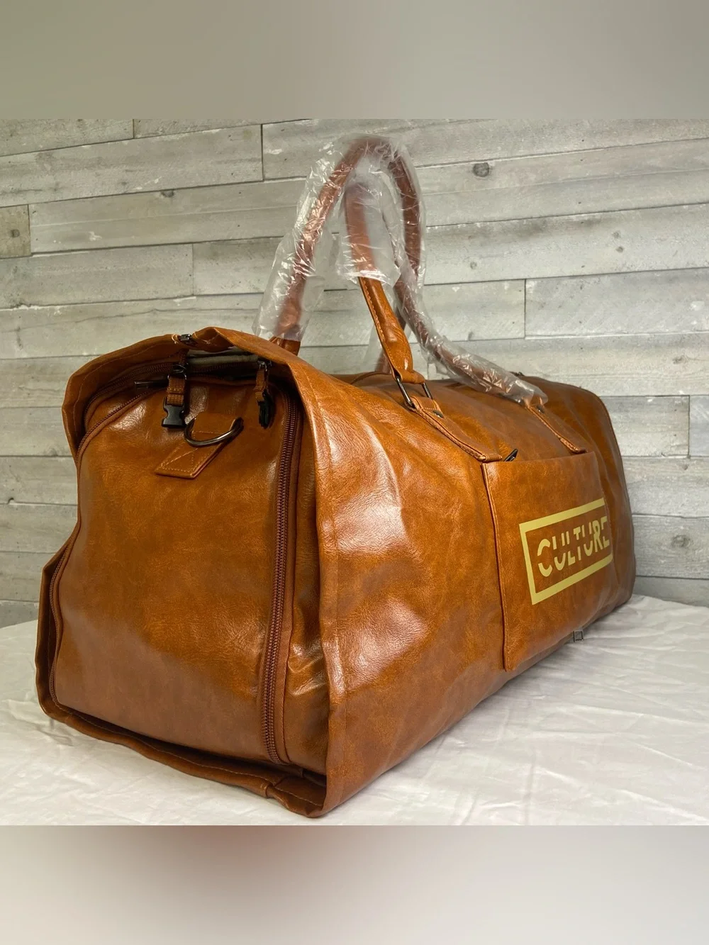 Culture Kicks tan duffel